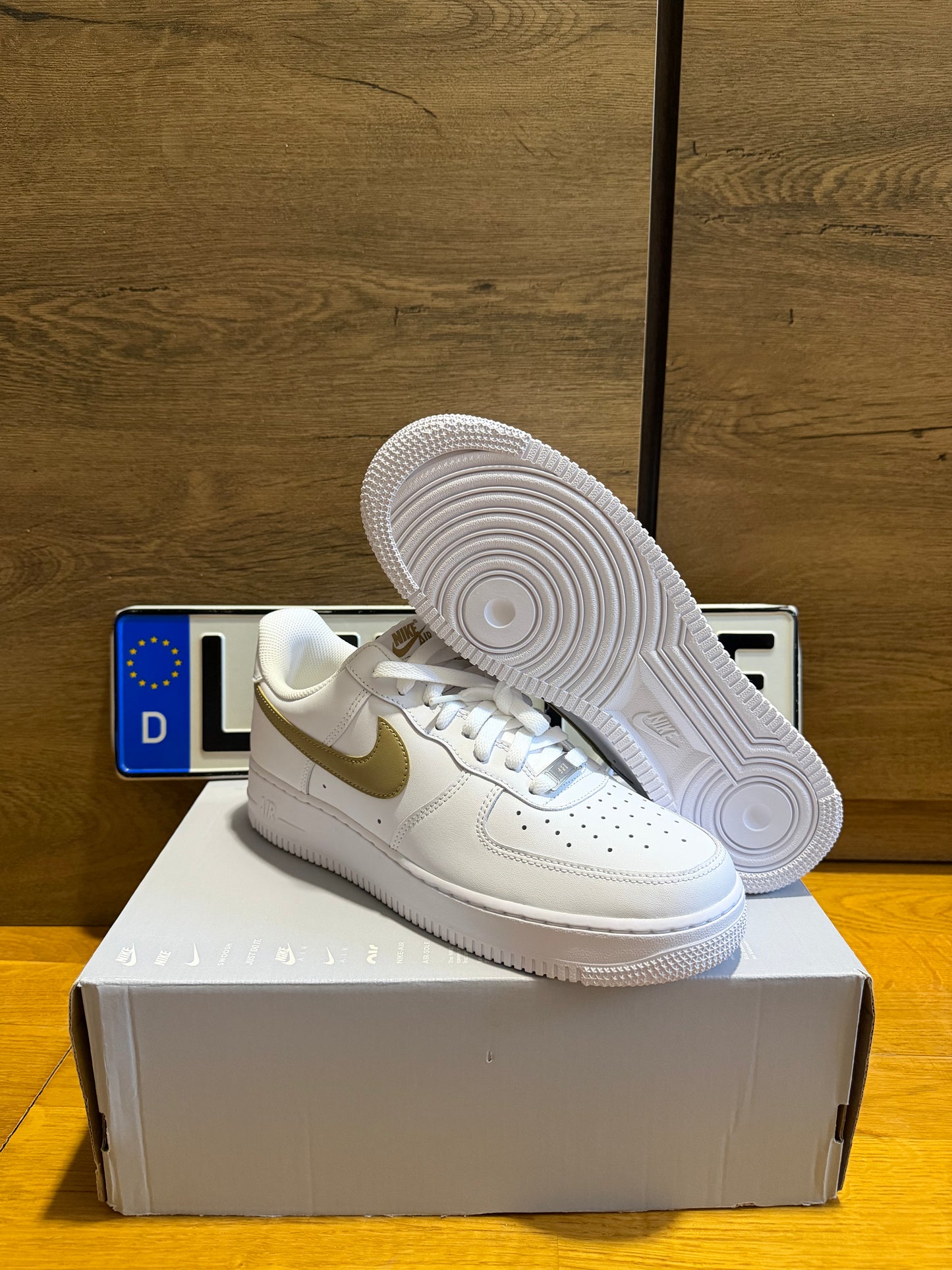 Nike Air Force 1 "Gold Swoosh”