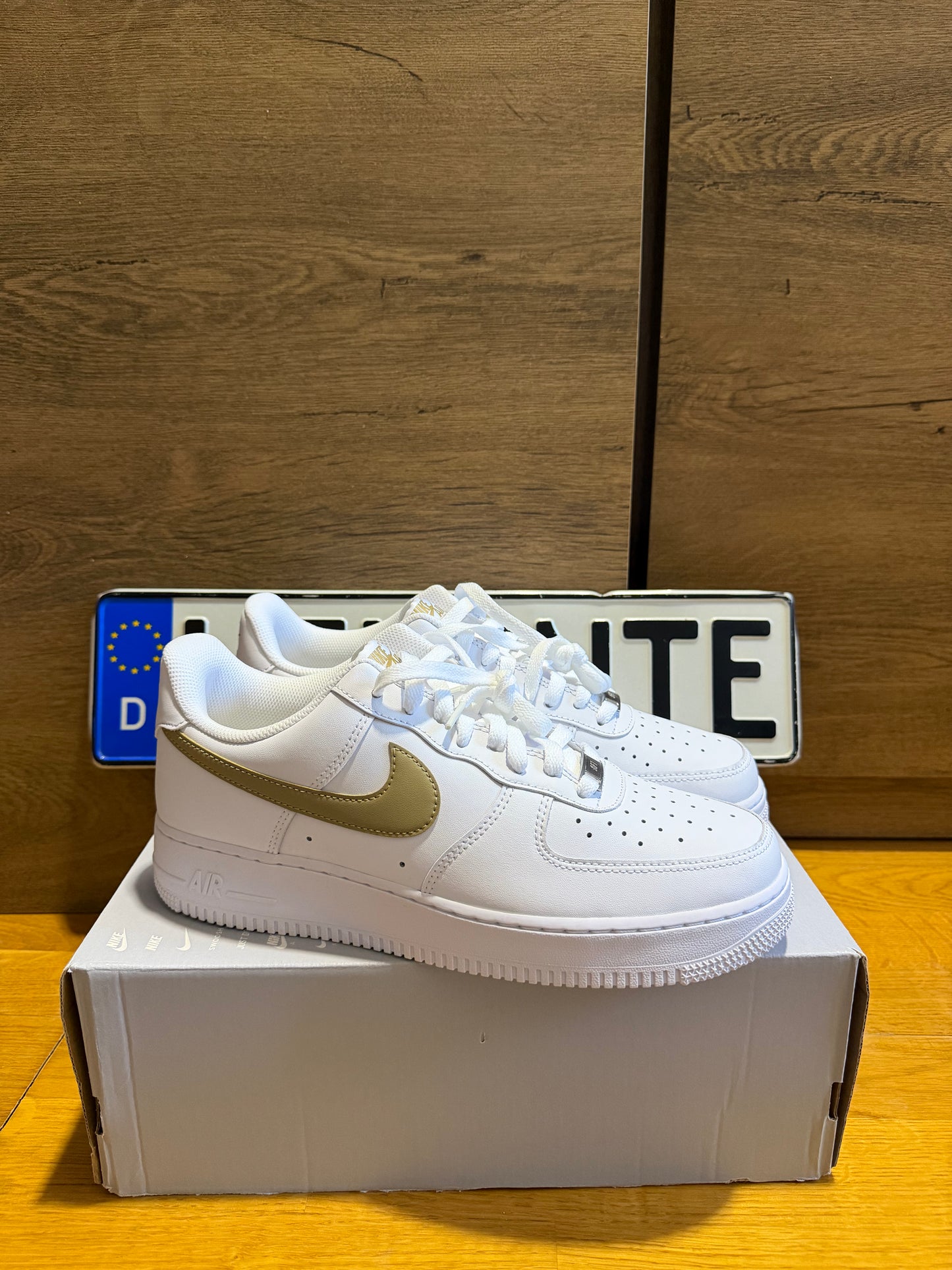 Nike Air Force 1 "Gold Swoosh”
