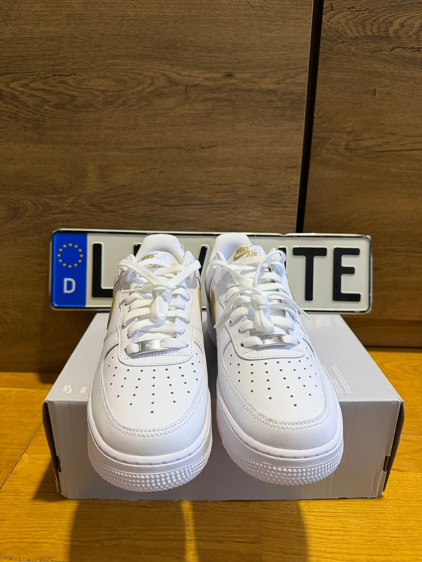 Nike Air Force 1 "Gold Swoosh”