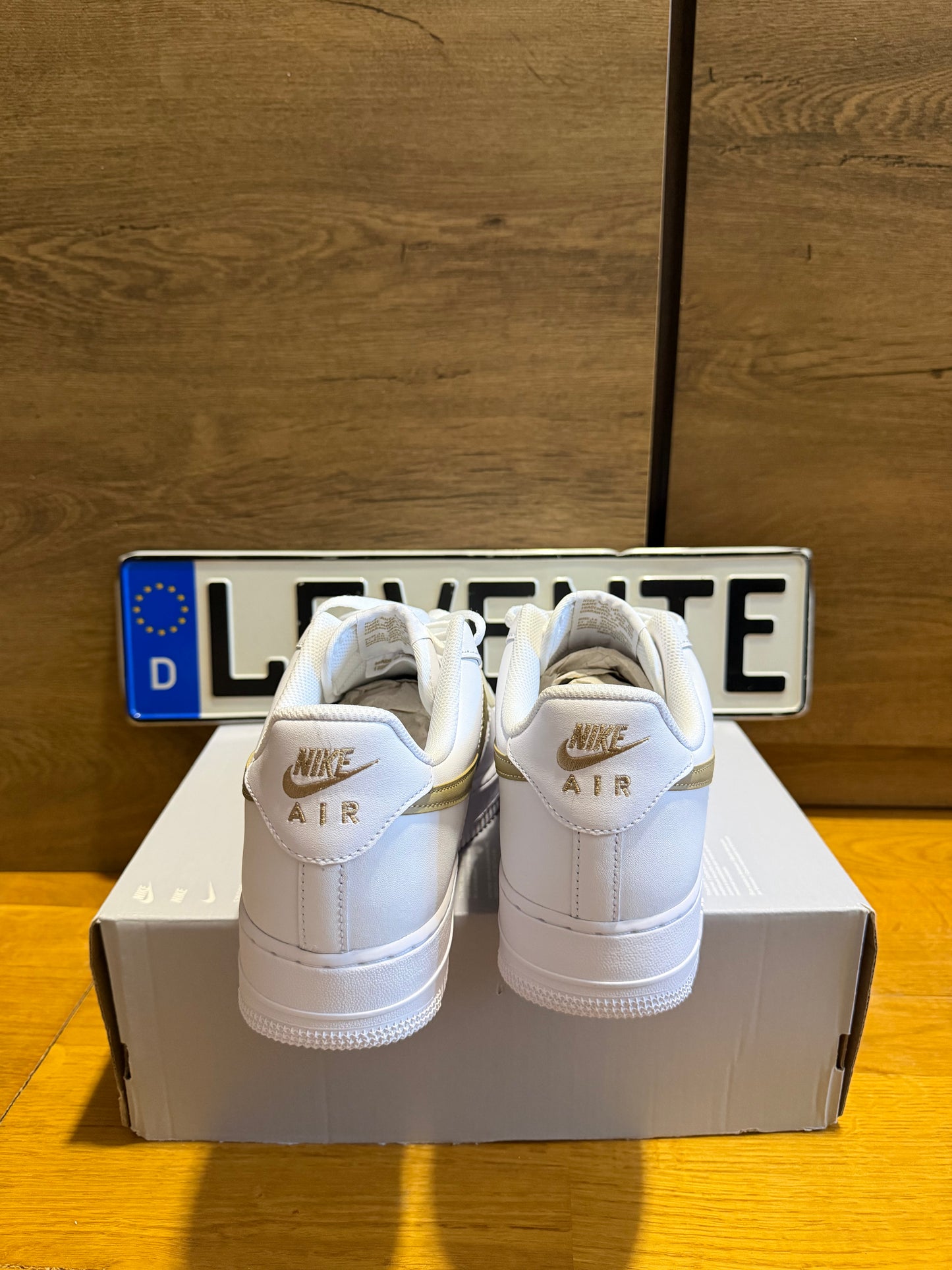 Nike Air Force 1 "Gold Swoosh”
