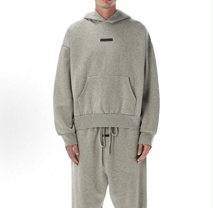 FEAR OF GOD ESSENTIALS HOODIE "CONCRETE HEATHER HOODIE" (FW25)